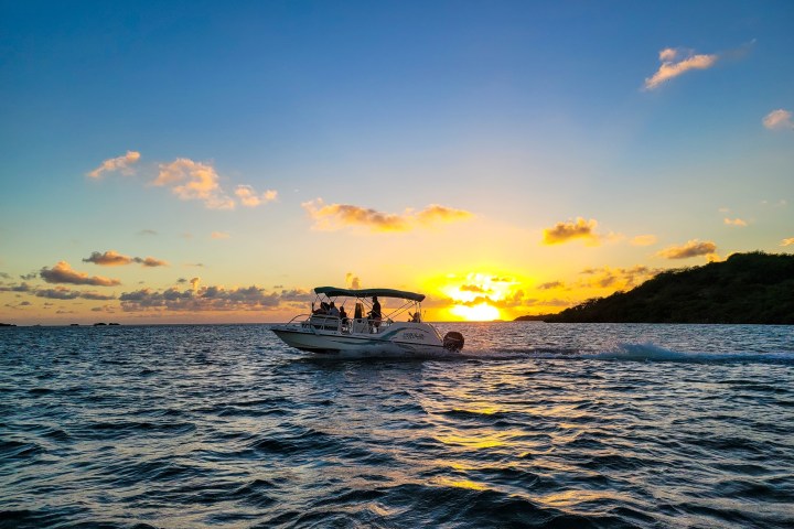 a sunset over a body of water