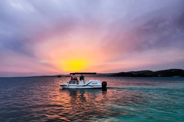 a small boat in a body of water